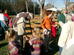 Shepherd pets the sheep the shepherdess sold Rose Anne.