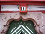 Jägerhäusle, the "hunter's hut", 1590 door lintel reproduction, faithfully carved with Roman ciphers, graces this town first officially chronicled in 1275.